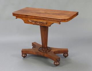 A William IV rosewood D shaped card table, raised on a turned column and triform base with bun feet 76cm h x 92cm w x 45cm d 
