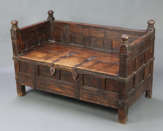 An 18th/19th Century Indian panelled hardwood and metal bound daybed 90cm h x 139cm w x 75cm d 
