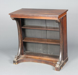 A Regency rectangular rosewood bookcase fitted adjustable shelves, raised on outswept supports with concave base 96cm h x 93cm w x 48cm d 