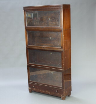 A mahogany 5 tier Globe Wernicke bookcase enclosed by glazed panelled doors, the base fitted a drawer 173cm h x 85cm w x 28cm d 