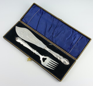 A cased pair of silver plated Edwardian lily pattern fish servers 