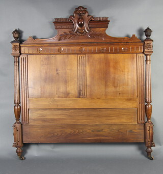 A 19th Century Continental carved walnut bed frame 153cm h x 141cm w x 202cm l 