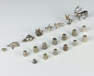 Eight silver plated figures of animals, 13 ditto thimbles 