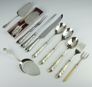 A pair of silver plated lily pattern salad servers, a ditto pair, a carving set and minor servers 