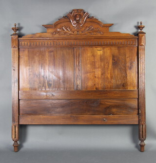 A Continental carved oak bed frame 140cm h x 122cm w x 205cm l 