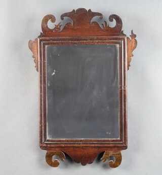 A Chippendale style bevelled plate wall mirror contained in a mahogany frame 43cm h x 30cm w  