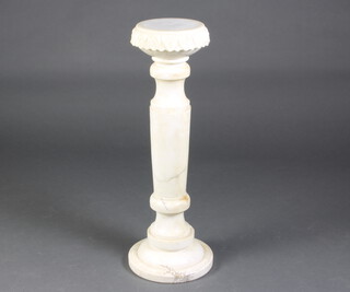 A 19th Century white carved alabaster pedestal raised on a circular base 82cm h x 29cm  