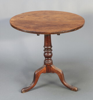 A 19th Century mahogany snap top tea table raised on a pillar and tripod base 75cm h x 75cm diam. 