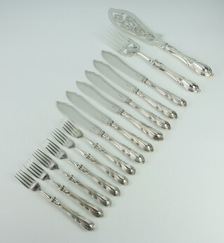 A pair of silver plated lily pattern fish servers and 6 pairs of ditto eaters 