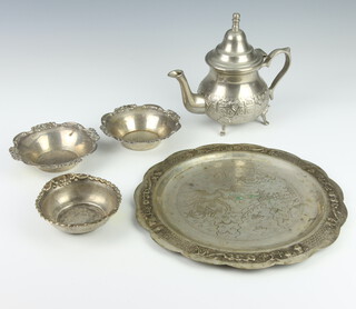 Three Egyptian repousse white metal bowls 126 grams, a salver and teapot 
