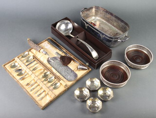 A cased plated ladle, a pair of ditto coasters and minor plated wares  
