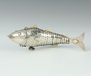 A Continental white metal articulated fish box 54 grams, 15cm 