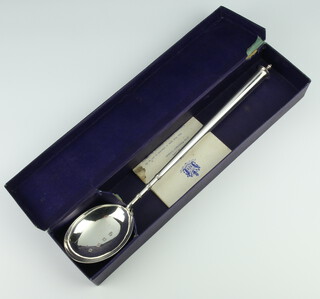 A silver presentation spoon (copy of the Salisbury ladle 1684) given to the Fishmonger's Livery on the Coronation of King George VI 12th May 1937, bearing 2 armorials London 1936, 156 grams, boxed 
