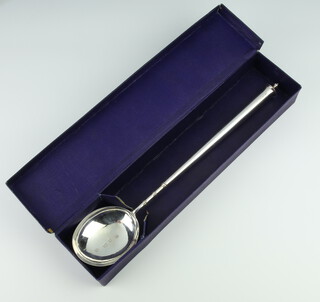 A silver presentation spoon (copy of the Salisbury ladle 1684) given to the Fishmonger's Livery on the Coronation of King George VI 12th May 1937, bearing 2 armorials London 1936, 156 grams, boxed
