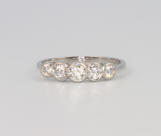A platinum 5 stone diamond ring approx. 0.7ct, 2.7 grams, size N 1/2