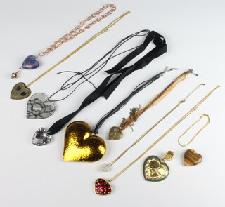 An enamelled heart pendant and minor heart pendants etc