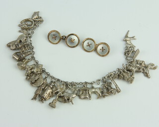 A silver charm bracelet together with a pair of gilt and tortoiseshell cufflinks, gross weight 82 grams 