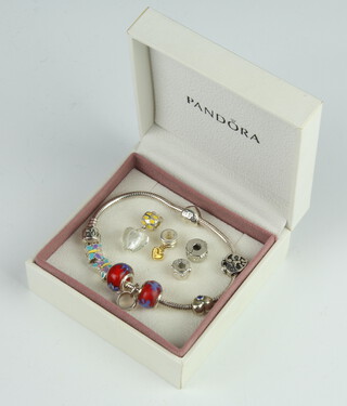 A Pandora bracelet and charms boxed 