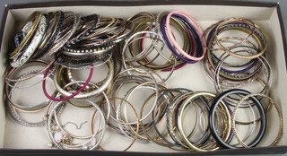 A collection of costume bangles