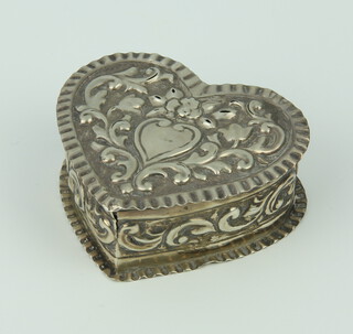 A Victorian repousse silver heart shaped trinket box London 1885 28 grams, 6cm (holed) 