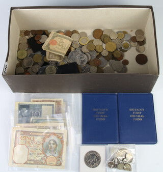 A Maria Theresa 1780, a small quantity of pre-1947 coins, Continental coins and banknotes, weighable silver 31 grams