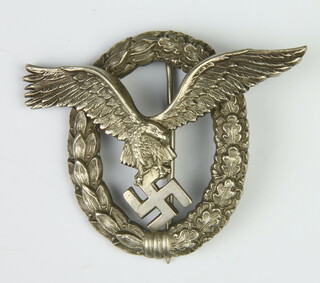 A German Third Reich Luftwaffe pilot's badge, the reverse marked E J Juncker Berlin SW
