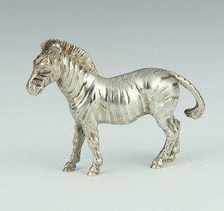 A cast silver model of a standing Zebra 58.7 grams, 6cm 