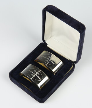 A pair of silver napkin rings, Oriana maiden world cruise 1996, Sheffield 1995, 68 grams 