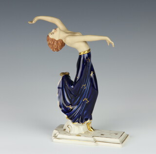 A Royal Dux figure of a semi clad dancer with blue and gilt decoration no.360 22cm 