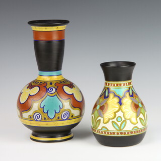 A Gouda Pottery oviform vase with geometric decoration 29cm, a squat baluster ditto decorated with flowers 17cm 