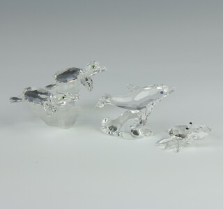 A Swarovski Crystal group of 2 turtles 7cm, a dolphin 4cm and a crab 2cm 