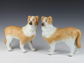 A pair of Victorian Staffordshire figures of standing dogs with tan decoration and gilt padlocks 28cm 