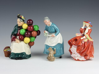 Three Royal Doulton figures - The Old Balloon Seller HN1315 19cm, Top O'The Hill HN4778 17cm and The Favourite HN2249 17cm 
