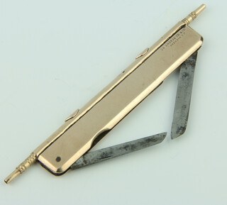 A yellow metal novelty propelling pencil, pocket knife and rule, engraved J C Vickery 181 and 183 Regent Street, 8cm 