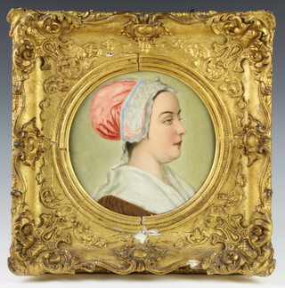 A Continental circular painted porcelain panel of a lady 20cm, contained in a gilt frame 