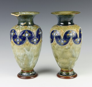 A pair of Royal Doulton green and blue salt glazed vases, bases with Royal Doulton mark, incised LW and impressed 3309, 27cm h x 11cm diam. 