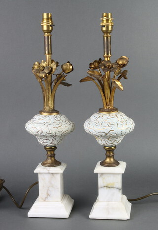 A pair of gilt metal ceramic and white marble table lamps raised on square marble bases marked Pauls Italy 56cm h x 11cm w x 11cm d 