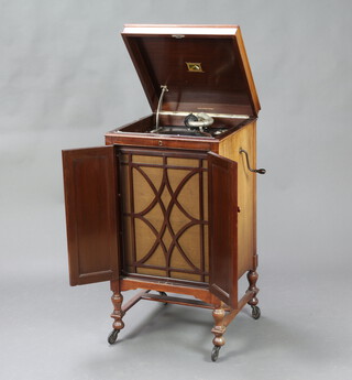 A His Masters Voice standard gramophone the lid marked Waddington & Sons Ltd. 58 Bond Street, Liverpool, contained in a mahogany case with hinged lid, raised on turned supports ending in casters 105cm h x 54cm w x 53cm d 