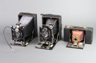 A Compur Ihagee folding camera, a Compur folding camera and a No.2 folding Brownie camera 