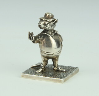 A cast silver figure of a dressed standing rat on a square base 65.9 grams, Birmingham 1987 
