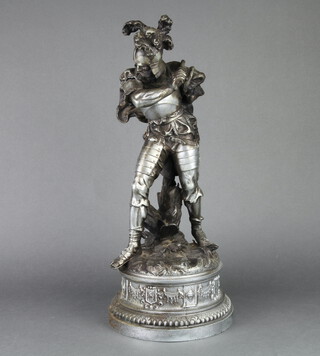 A 19th Century spelter figure of a standing warrior, raised on circular base 50cm h x 19cm