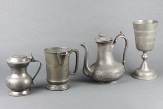 A 17th Century style pewter challis 26cm x 12cm, an Edward VII LCC pewter spouted quart measure marked S Higgs the base engraved, a baluster lidded pewter tankard with crowned Tudor rose touch mark 14cm h and a Britannia metal coffee pot (hinge f) 