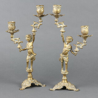 A pair of 19th Century brass twin light candelabrum supported by figures 33cm h x 10cm  