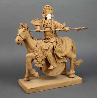 Tay Guan Heng, a curious figure of a mounted warrior raised on a square base 42cm x 30cm x 35cm 