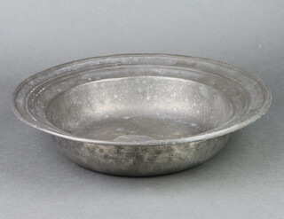 An 18th Century circular pewter bowl, the inner rim with 2 touch marks, the reverse with thistle touch mark marked 95 and 1 other touch mark, 8cm x 34cm 