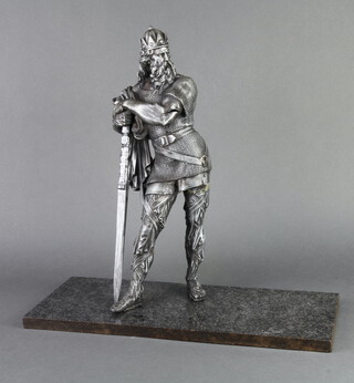 A spelter figure of a standing warrior with sword, raised on a rectangular marble base 48cm h x 51cm w x 20cm d, together with an associated wooden sword 