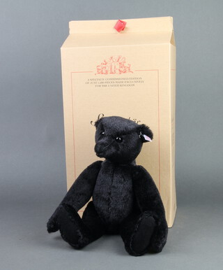 A Steiff limited edition Steiff Club black teddy bear complete with certificate no.1413 of 1500, 35cm 
