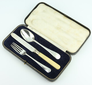 A cased silver christening spoon, fork and knife, Sheffield 1936 