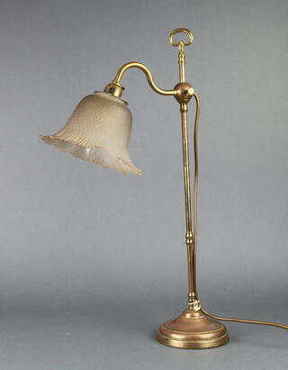 A Victorian style adjustable reading lamp raised on a circular column and spreading foot with opaque glass shade 54cm h x 13cm 