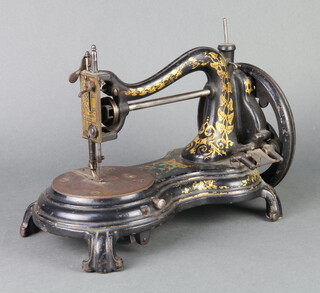 Jones & Company, a manual sewing machine together with a Jones & Co. set of instructions (some tears) 